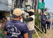 Tim Maung ASRI Tertibkan Spanduk Liar di Tugu Belimbing, Wajah Kota Depok Kembali Rapi